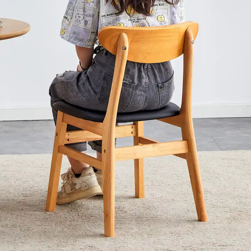 The stylish and durable solid wood dining chair, small curved back, PU cushion, and beautiful shape match with any room